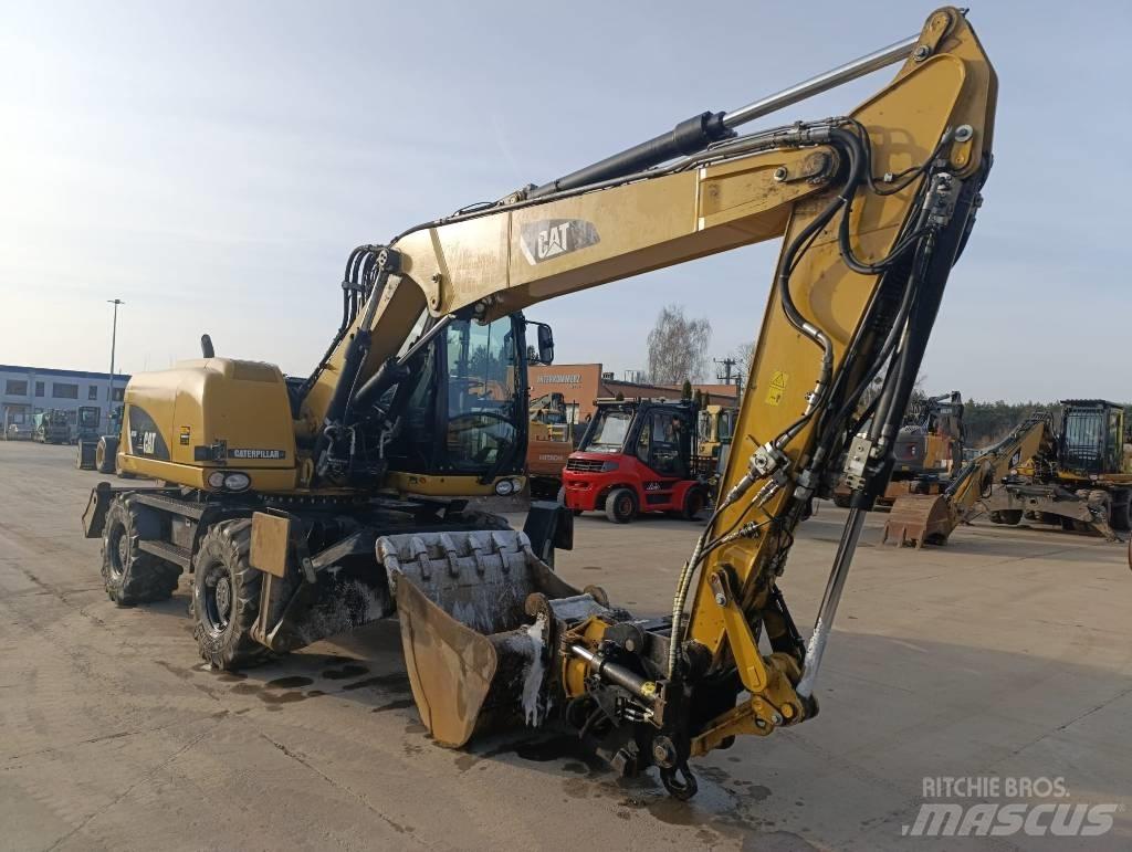 CAT M 313 D Mobilbagger
