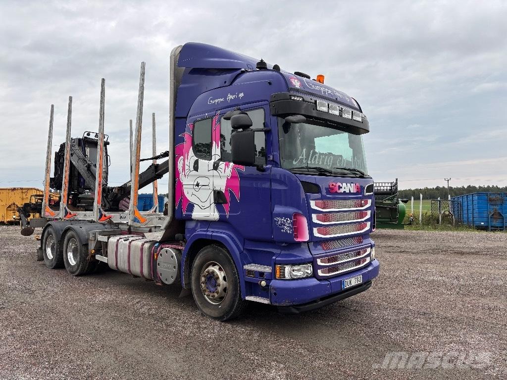 Scania 560. 6x4 Holzfahrzeuge