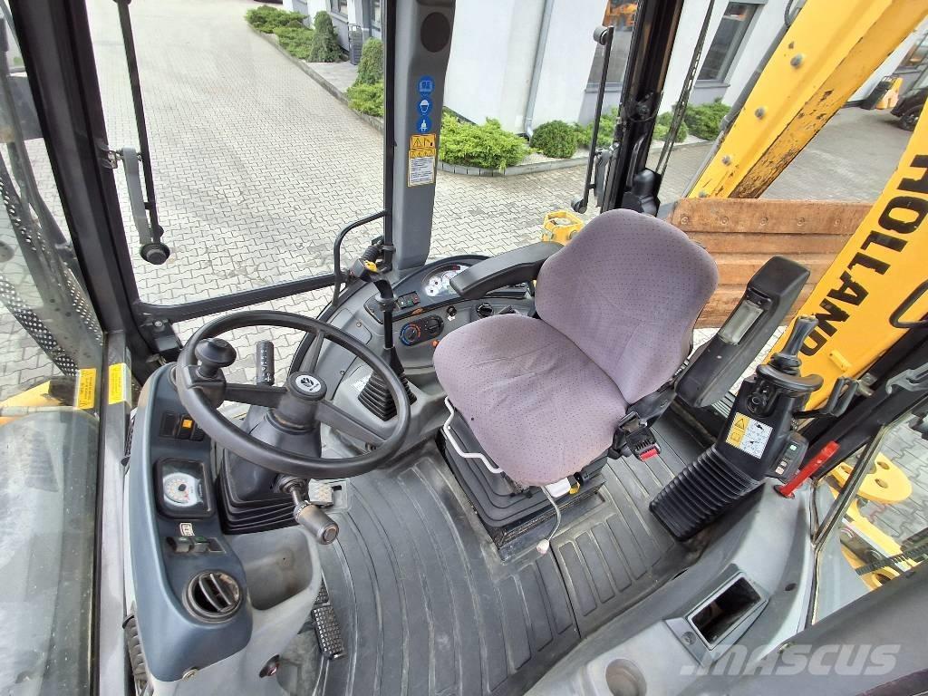 New Holland B 115 C Baggerlader