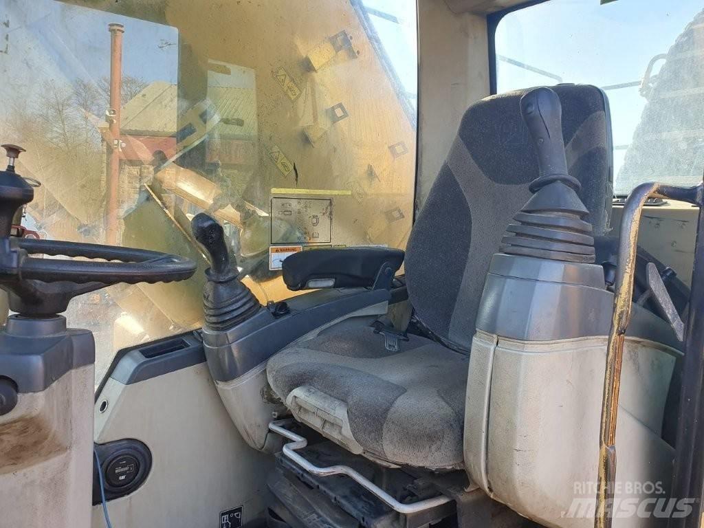 CAT M 325 C MH Materialumschlag