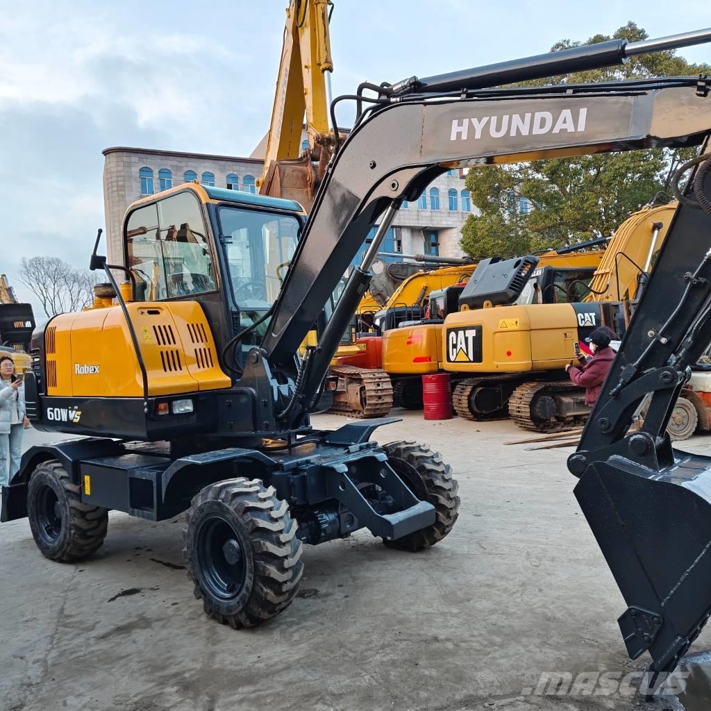 Hyundai 60 W VS Mobilbagger