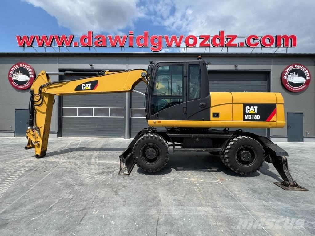 CAT M 318 D Mobilbagger