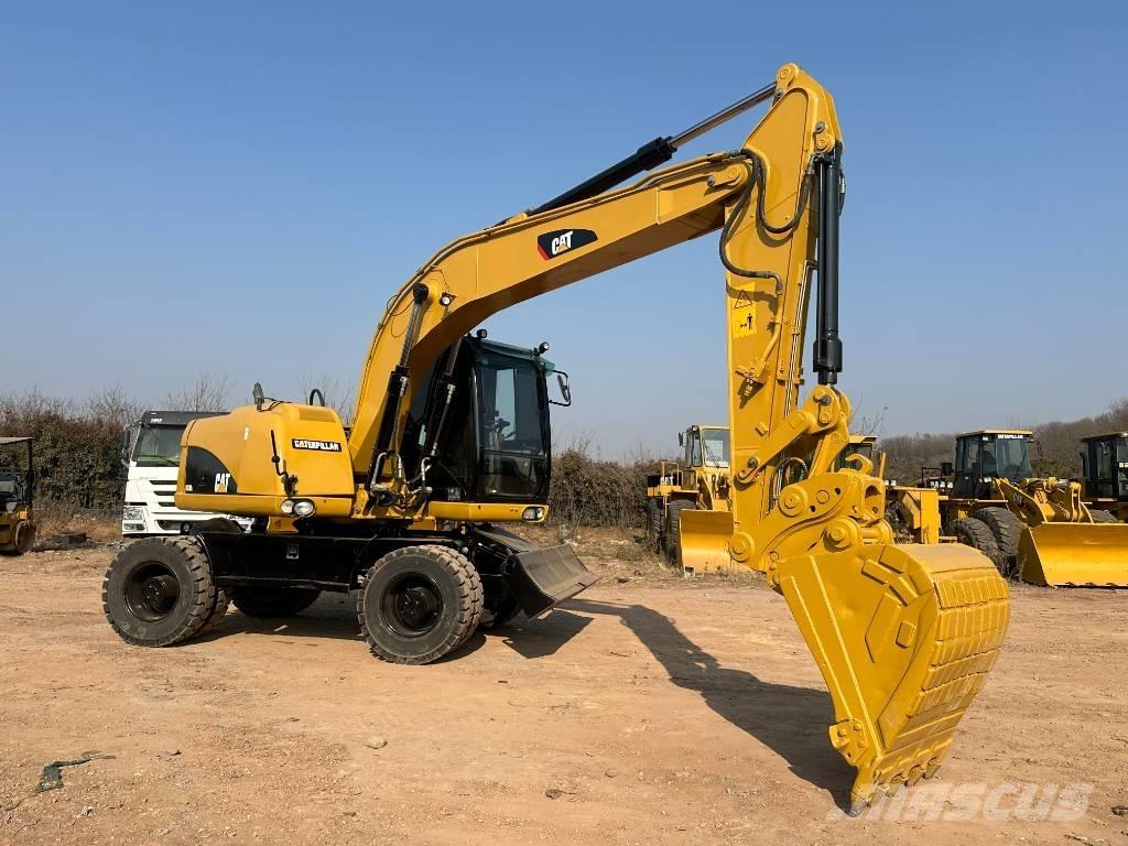 CAT M 320D Mobilbagger