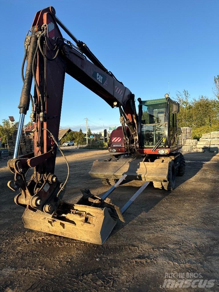 CAT 313 D Mobilbagger