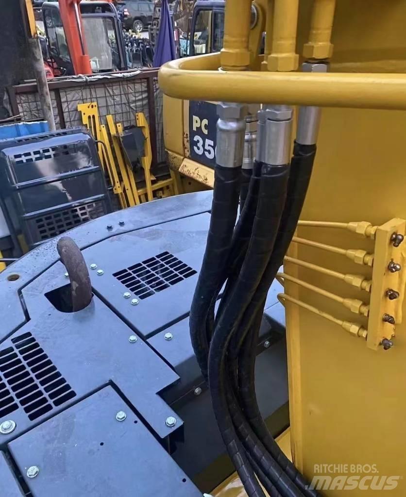 Komatsu 128 US Raupenbagger
