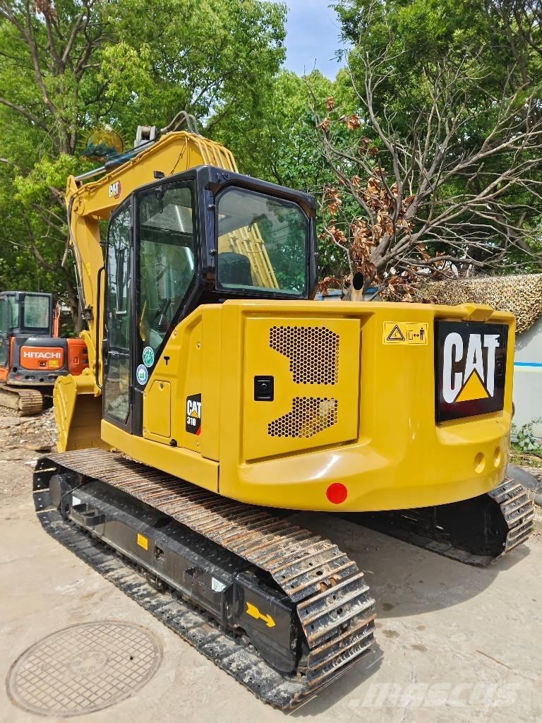 CAT 310 Raupenbagger