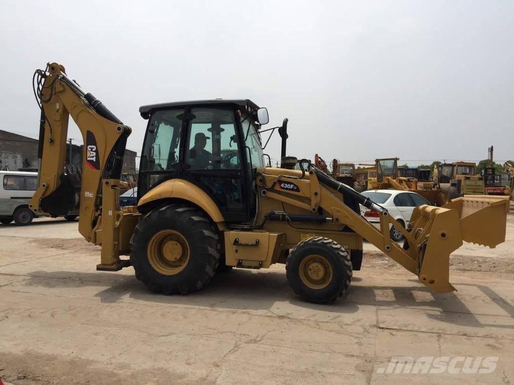CAT 430F Baggerlader