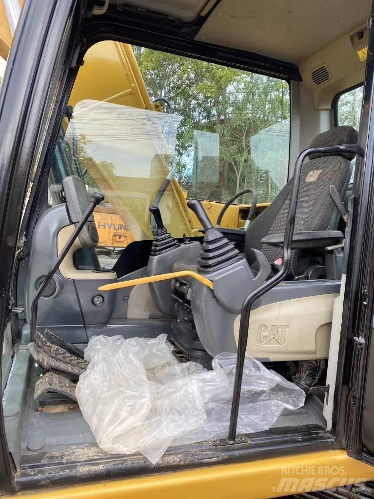 CAT 313 D Mobilbagger
