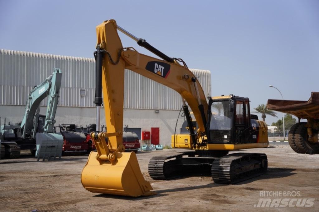 CAT 323D3 Mobilbagger
