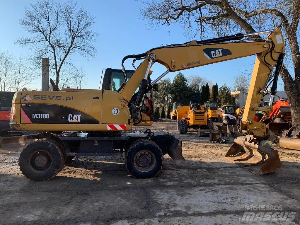 CAT M 318 D Mobilbagger