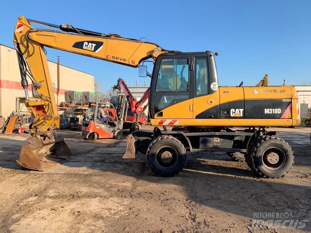 CAT M 318 D Mobilbagger