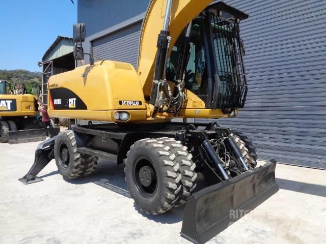 CAT M 318 D Mobilbagger