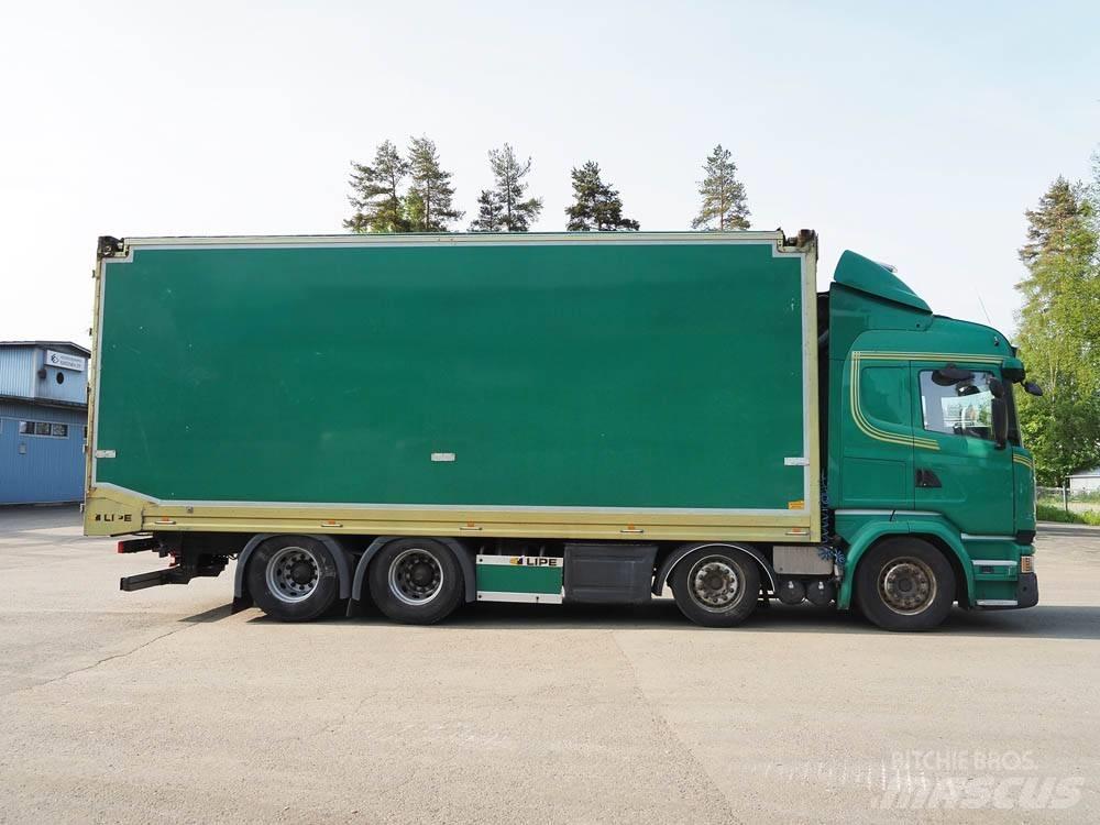 Scania R 730 Holztransportanhänger