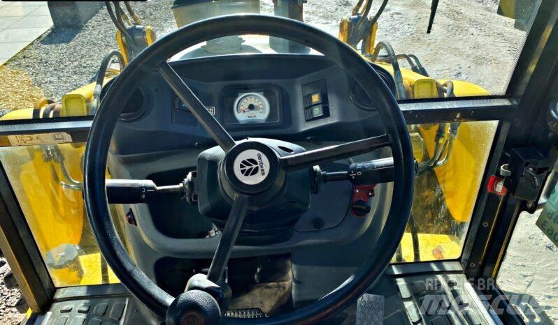 New Holland B 115 Baggerlader
