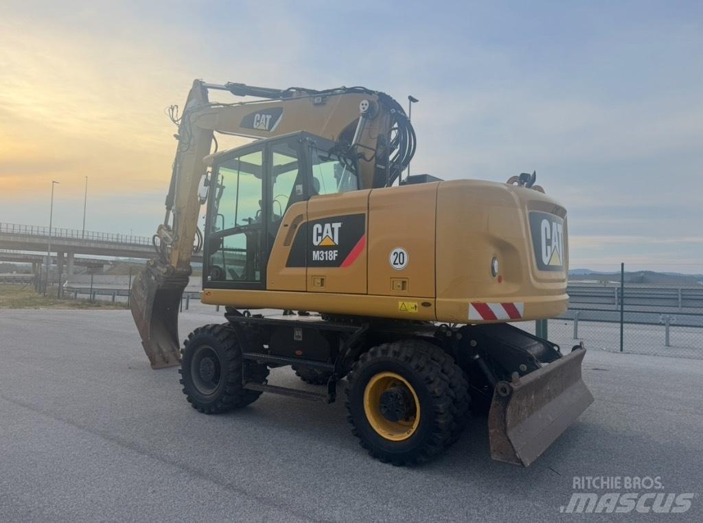 CAT M 318 F Mobilbagger