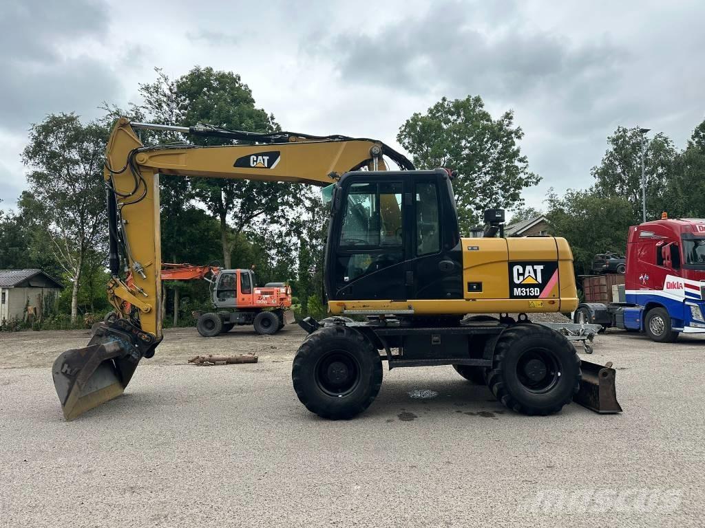 CAT M 313 D Mobilbagger