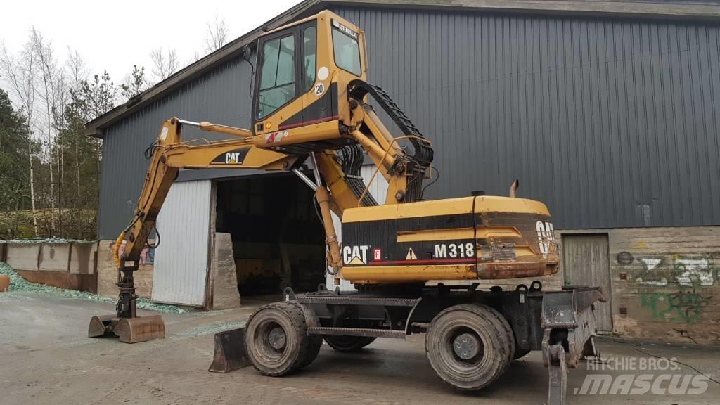 CAT M 318 Materialumschlag