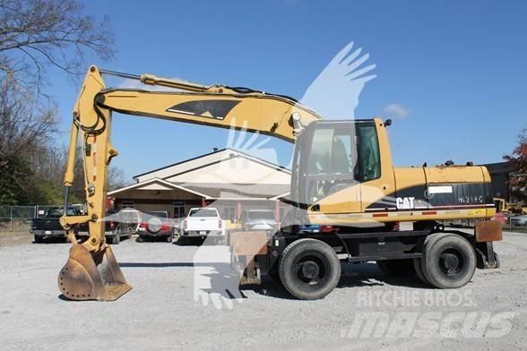 CAT M318C Mobilbagger