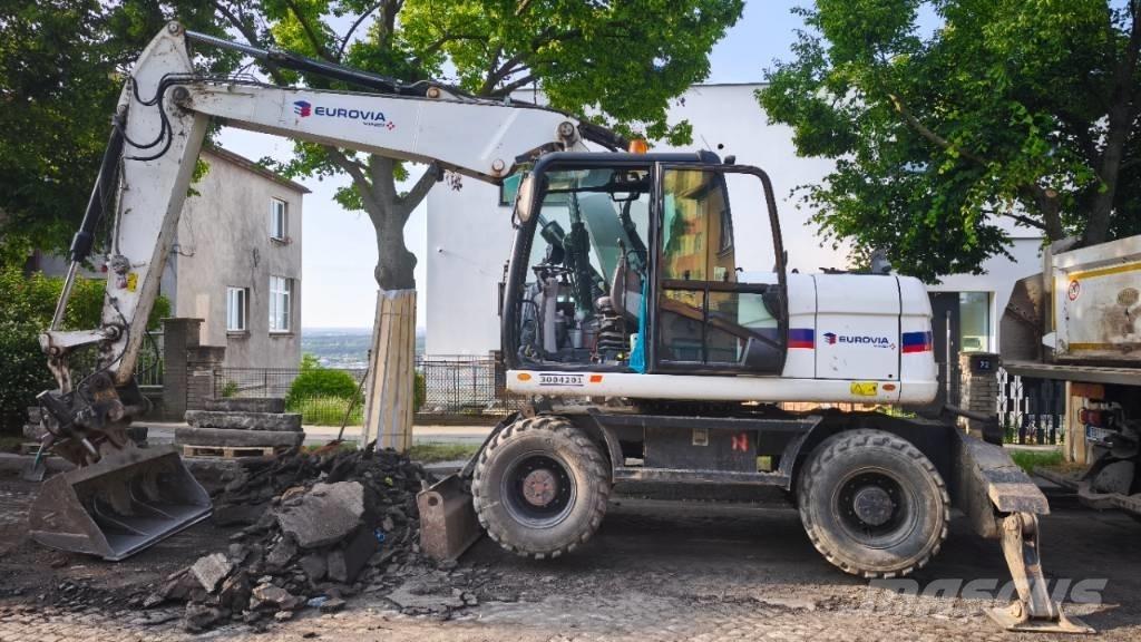 CAT 313 D Mobilbagger