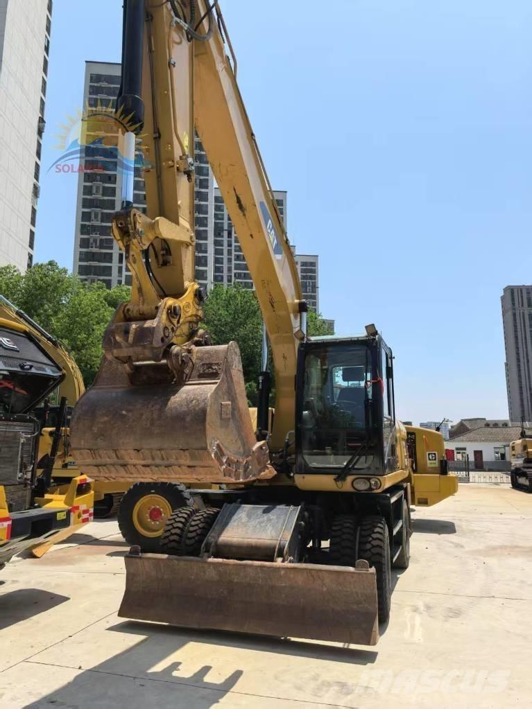 CAT M 320D2 Mobilbagger