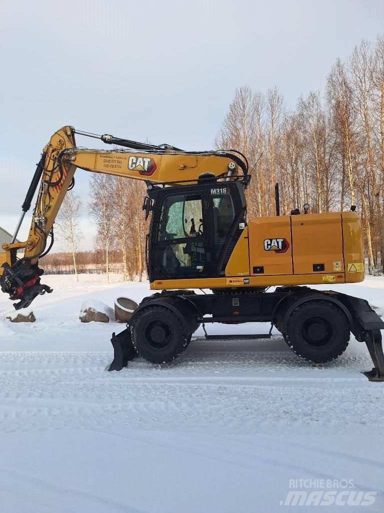 CAT M 318 Mobilbagger