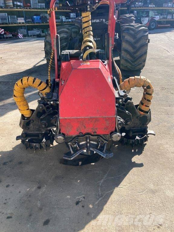 Komatsu C 144 Harvester