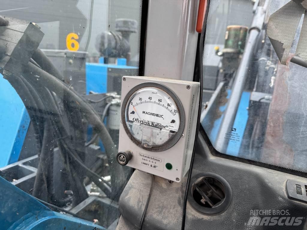 Fuchs MHL 320 Materialumschlag