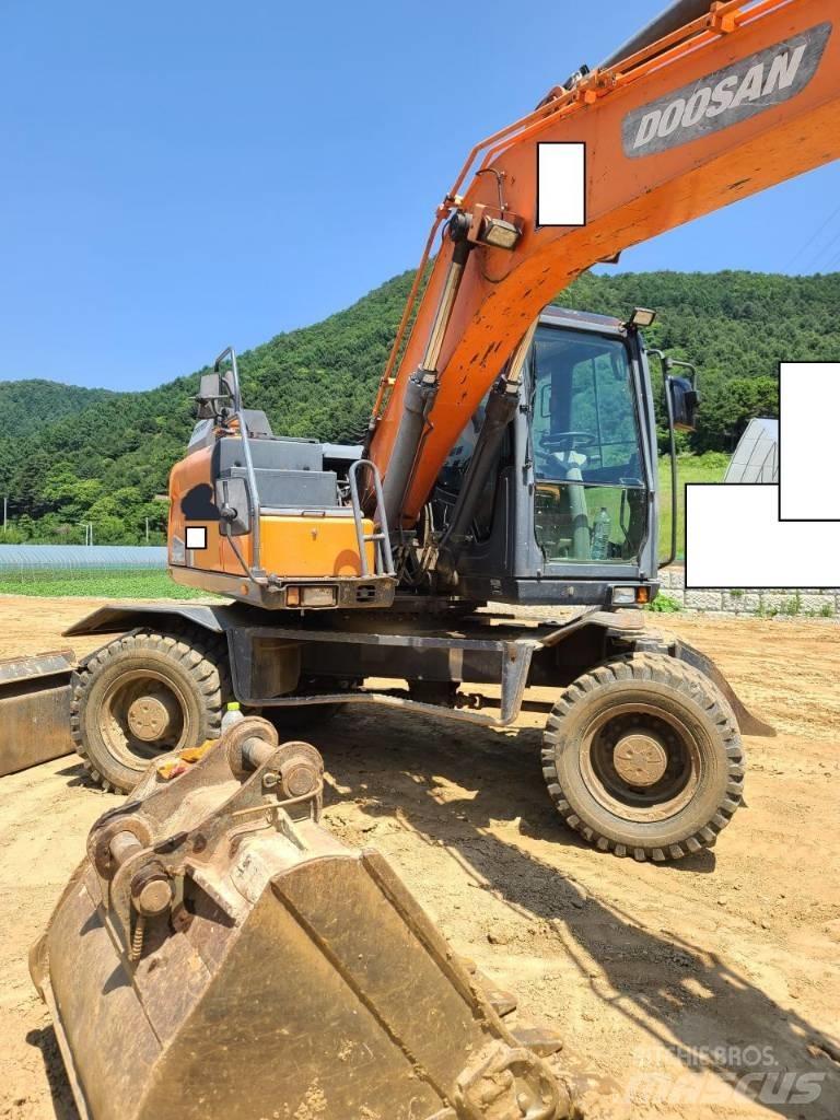 Doosan DX 140 W Mobilbagger