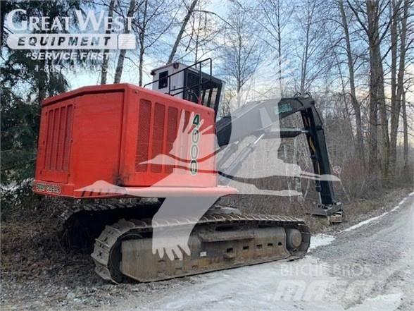 Madill 4000 Gelenkausleger Lader
