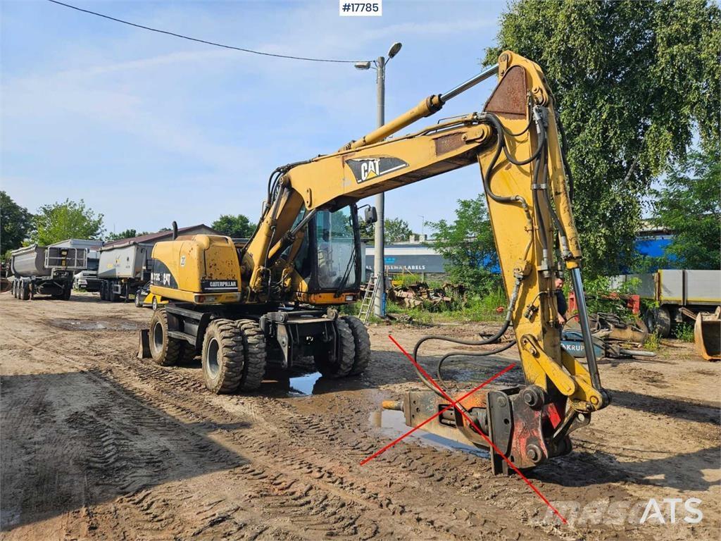 CAT M313 C Mobilbagger