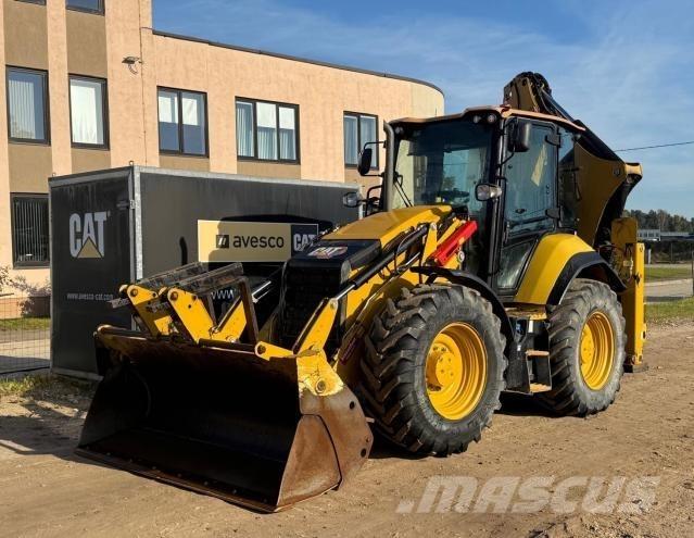 CAT 444 Baggerlader