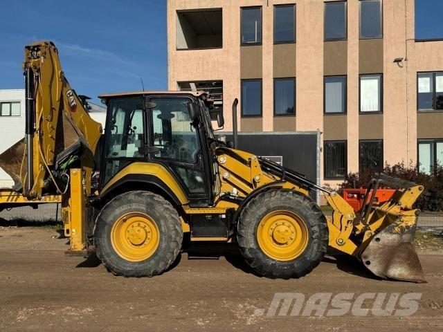 CAT 444 Baggerlader
