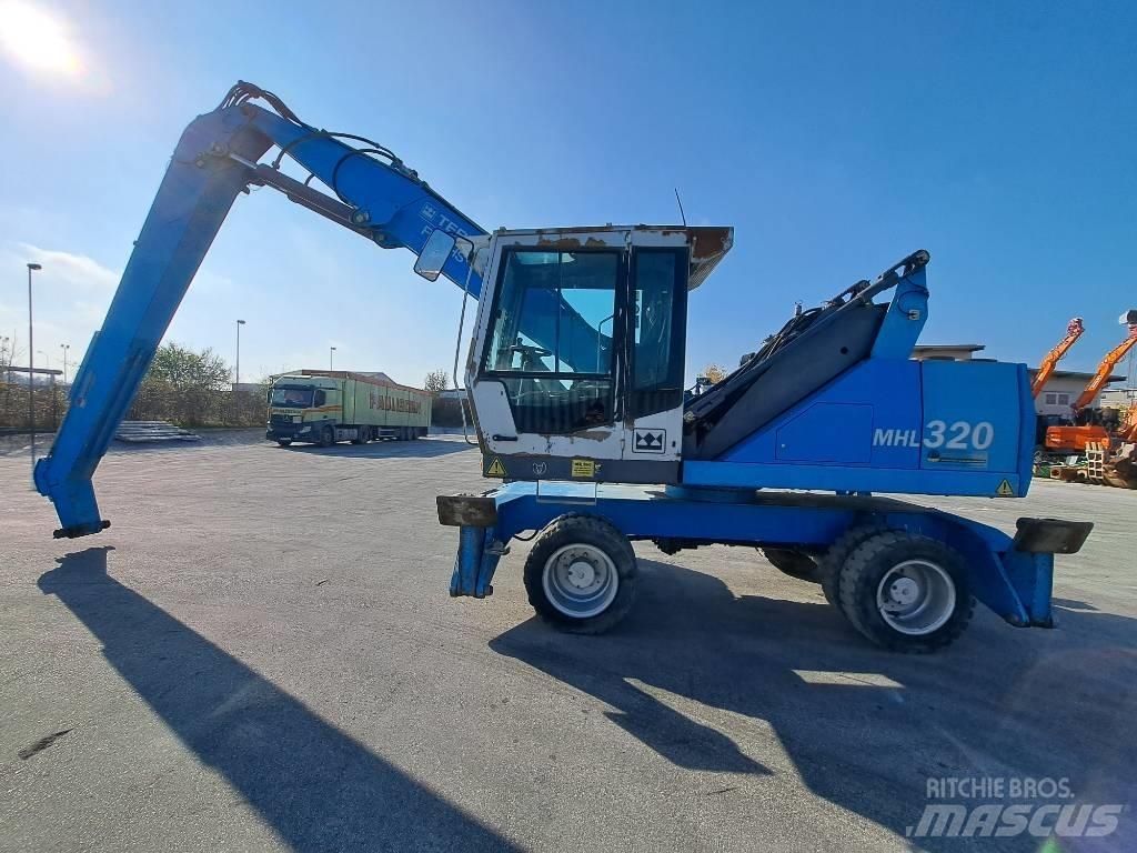 Fuchs MHL 320D Materialumschlag