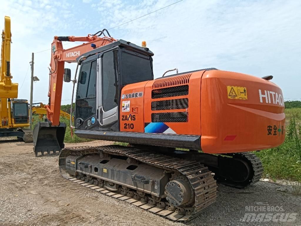 Hitachi ZX 210 Materialumschlag
