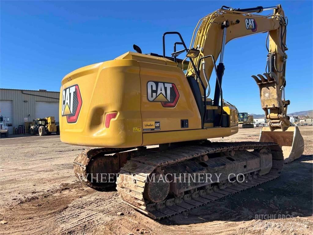 CAT 317 TH Raupenbagger