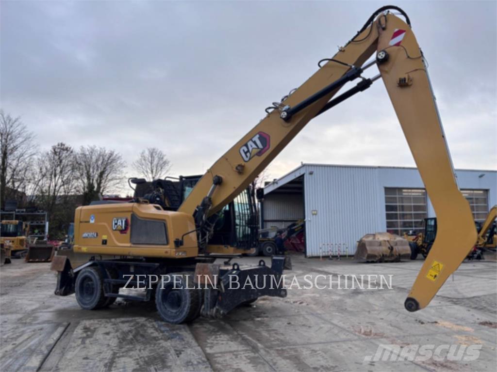CAT MH3024-06C Abrissbagger