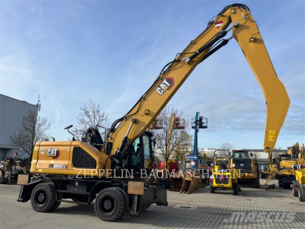 CAT MH3024-07A Abrissbagger