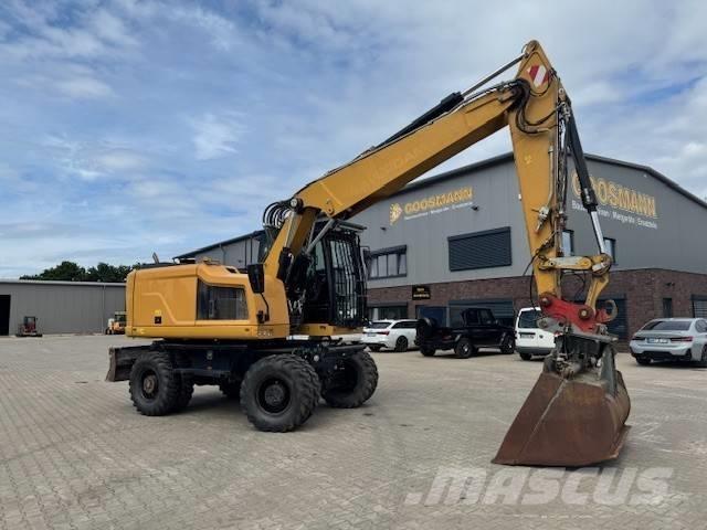 CAT M 318 F Mobilbagger