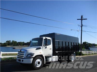 Hino 338 Holztransportanhänger