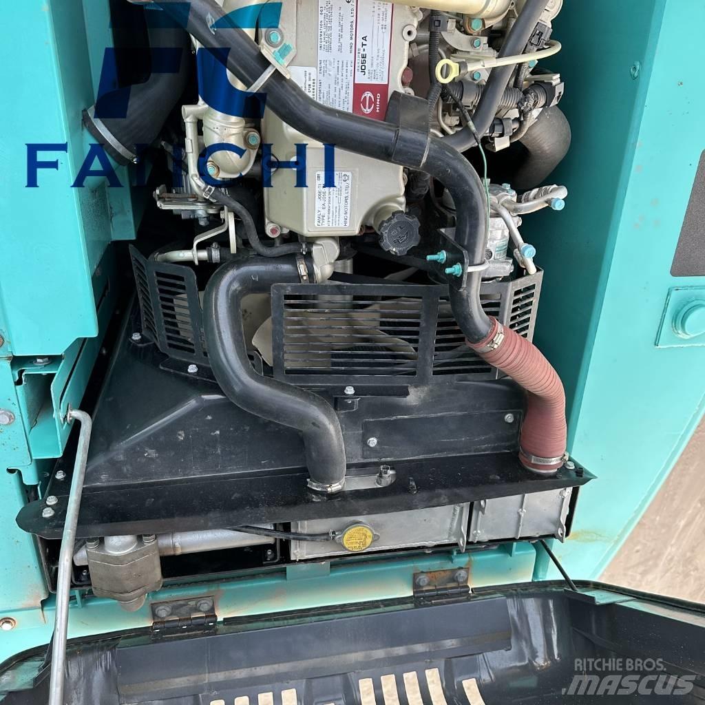 Kobelco sk200D Materialumschlag