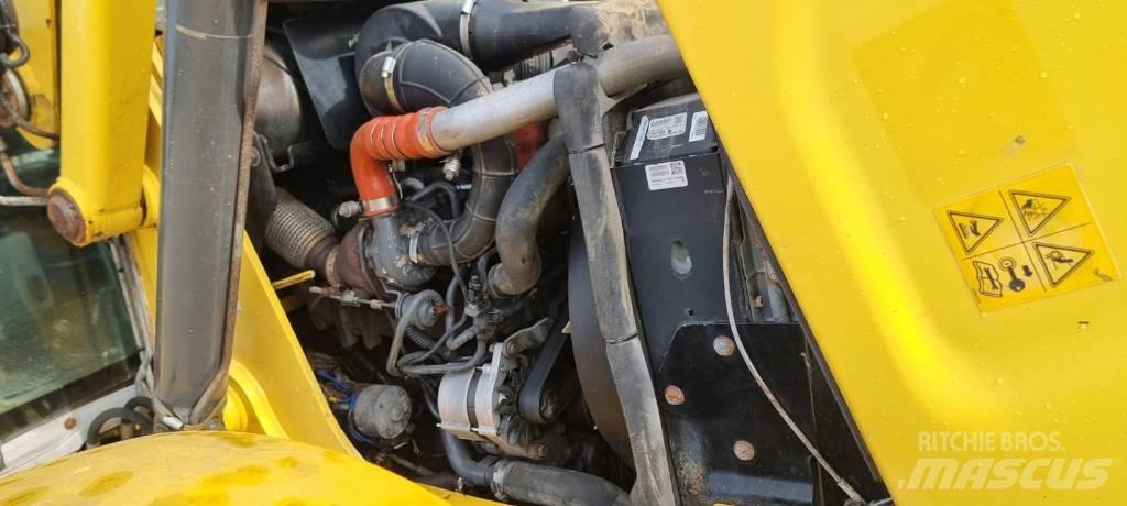 New Holland B 115 C Baggerlader