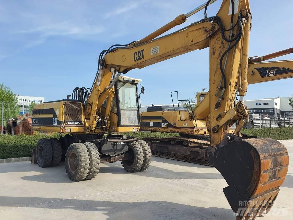 CAT M 318 Mobilbagger
