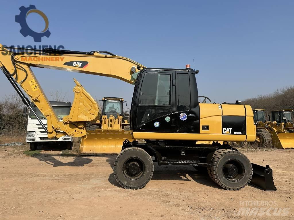 CAT M 320 D2 Mobilbagger