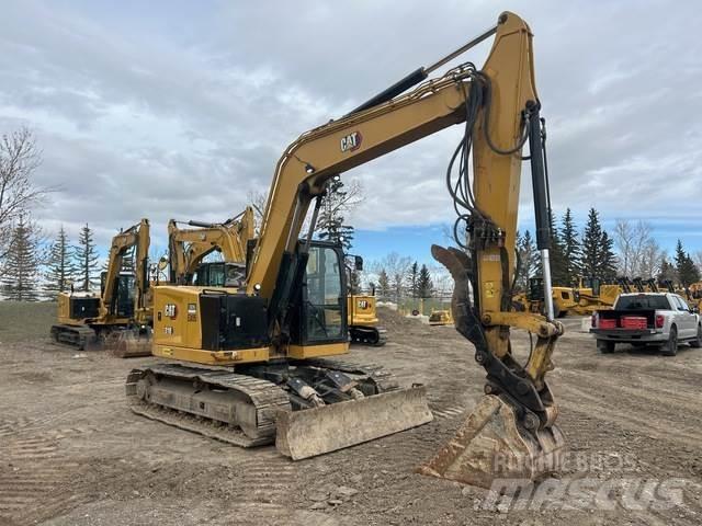 CAT 310 Raupenbagger