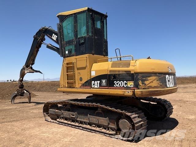 CAT 320C Gelenkausleger Lader
