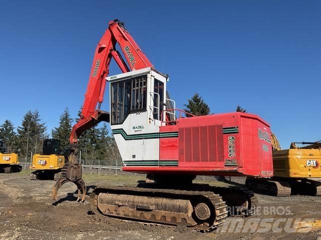Madill 3800C Gelenkausleger Lader