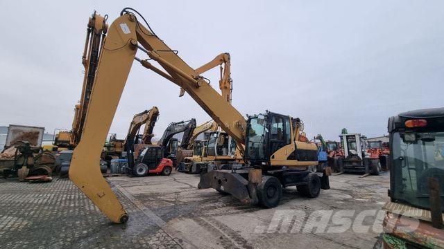 CAT M 318 C / 35 Mobilbagger