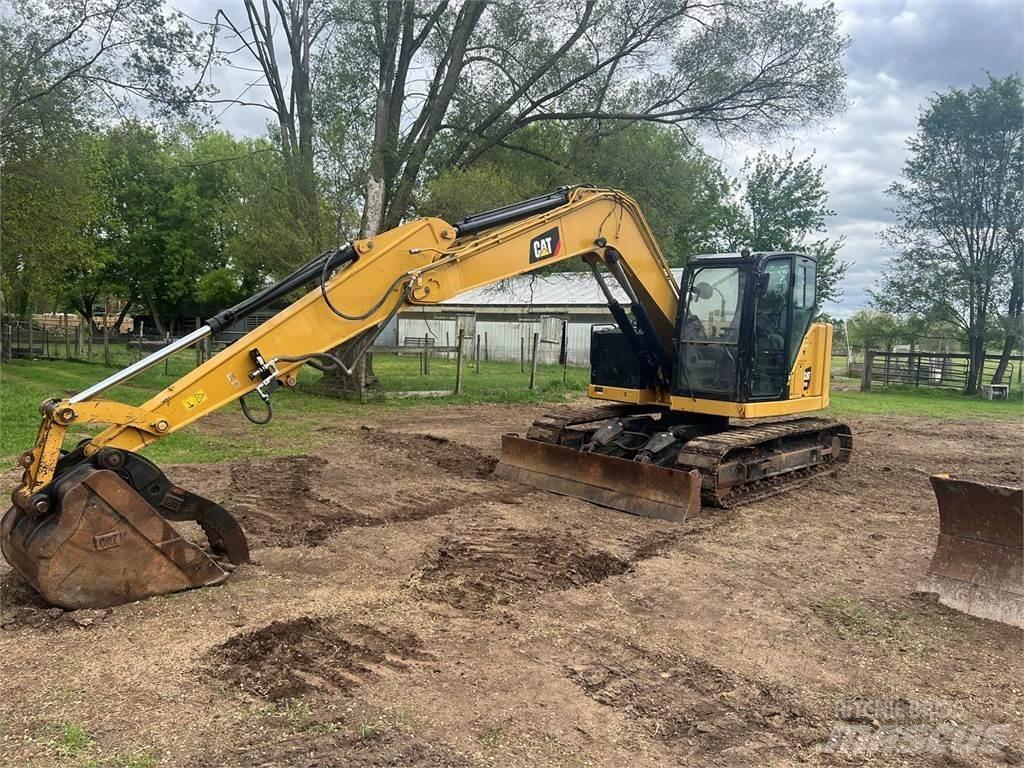 CAT 310 Raupenbagger