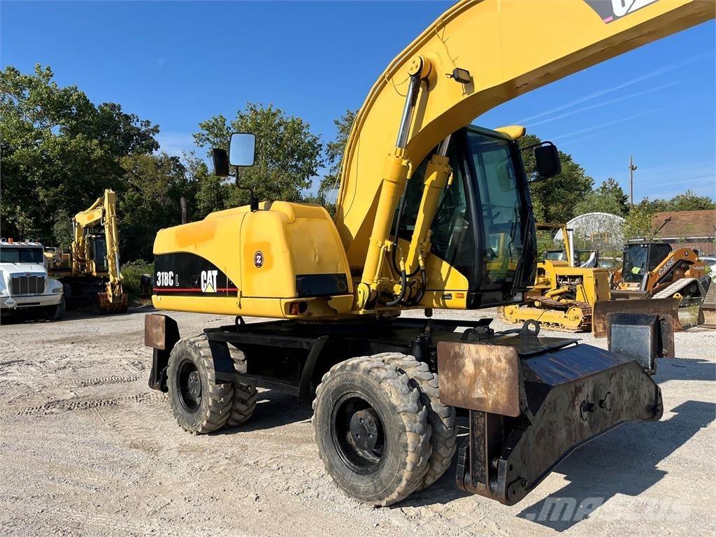 CAT M318C Mobilbagger