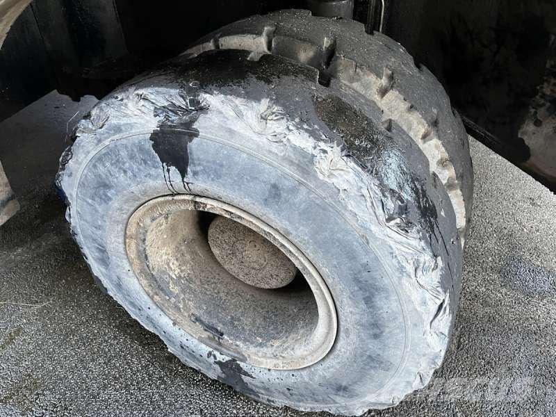 CAT M325D MH Materialumschlag